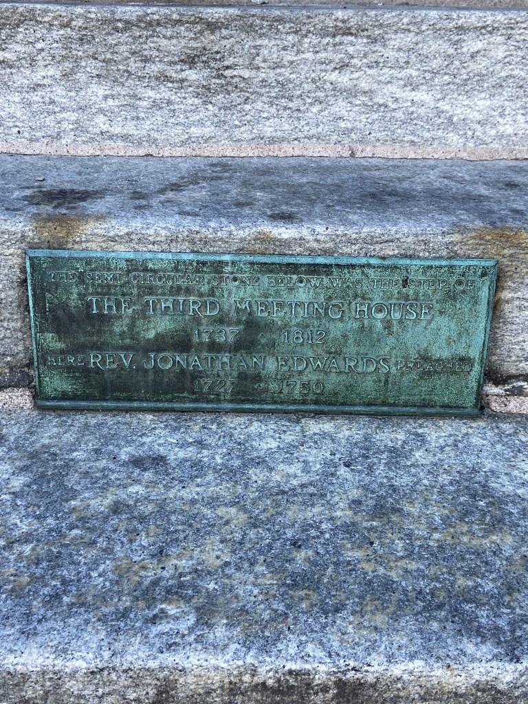 "The semi circular stone below was the step of the Third Meeting House 1737-1812. Here the Rev. Jonathan Edwards preached 1727-1750." Northampton MA