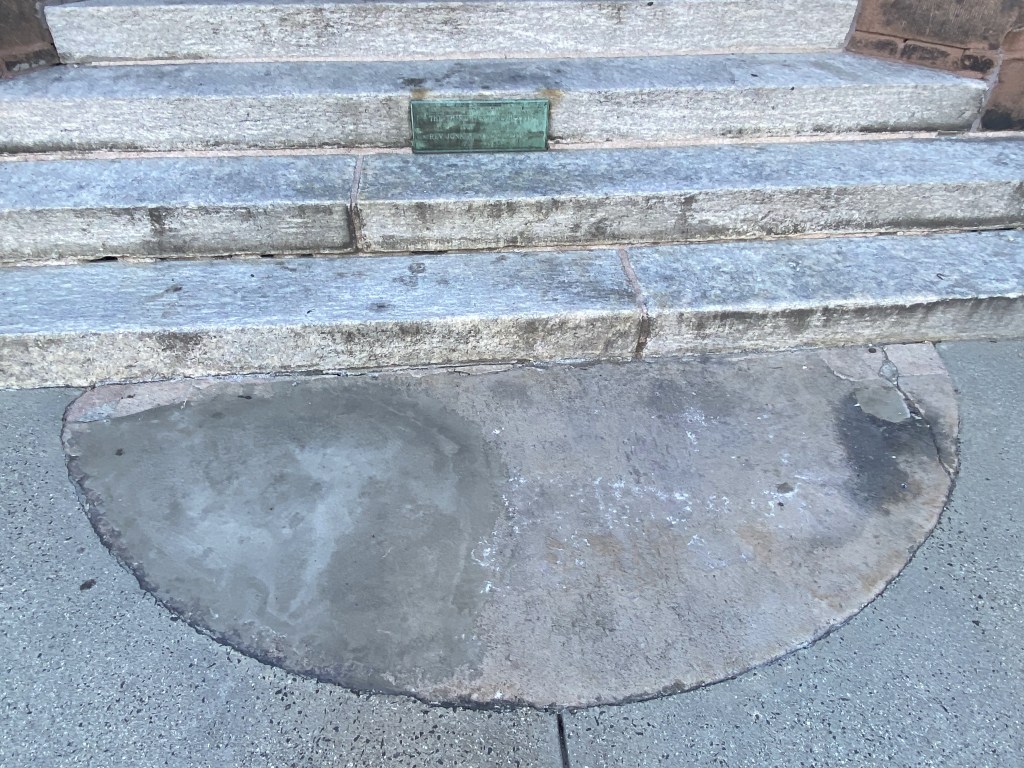 "The semi circular stone below was the step of the Third Meeting House 1737-1812. Here the Rev. Jonathan Edwards preached 1727-1750." Northampton MA
